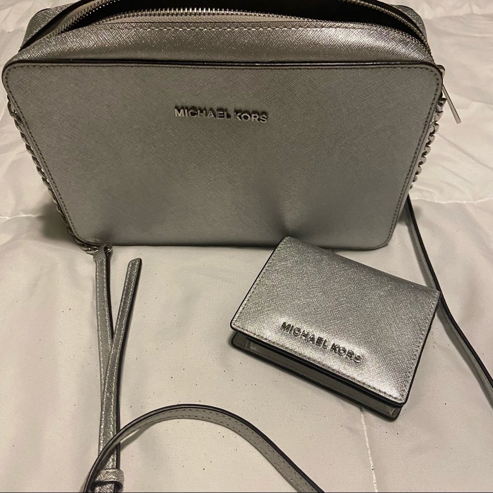 Silver Michael Kors handbag and wallet